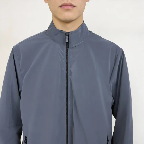 Kuasha Fabric men’s winter jacket in ash grey color with metal zipper pockets